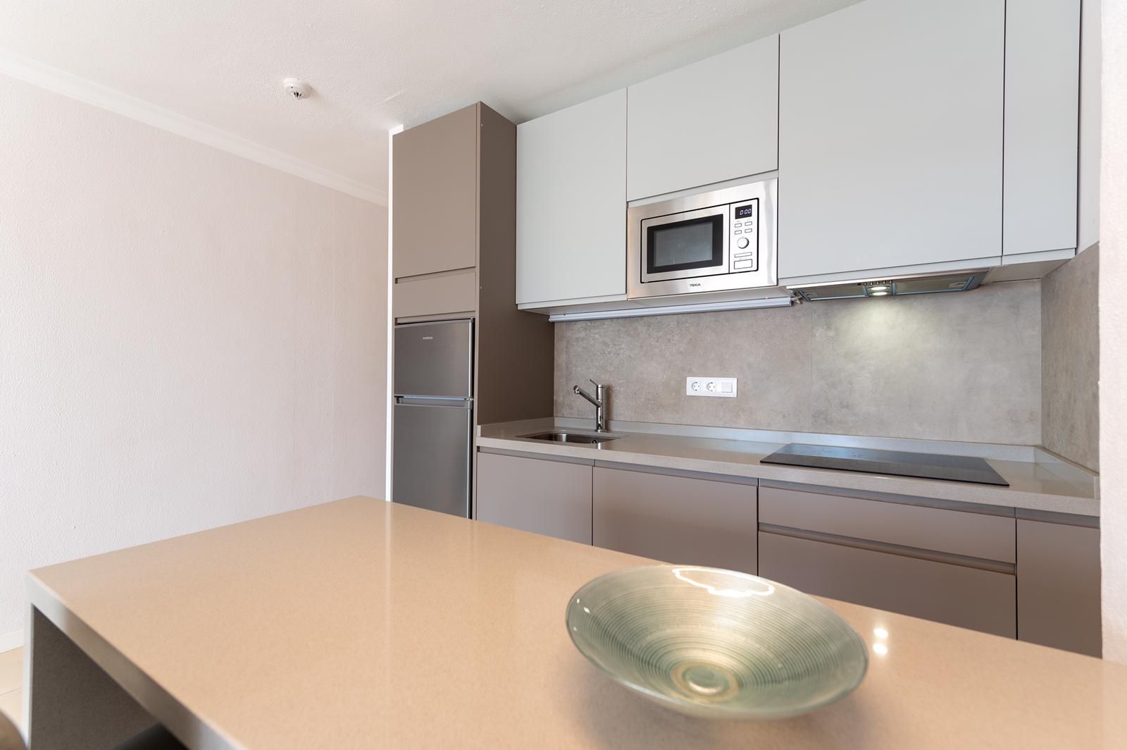 Kitchen counter with built-in microwave