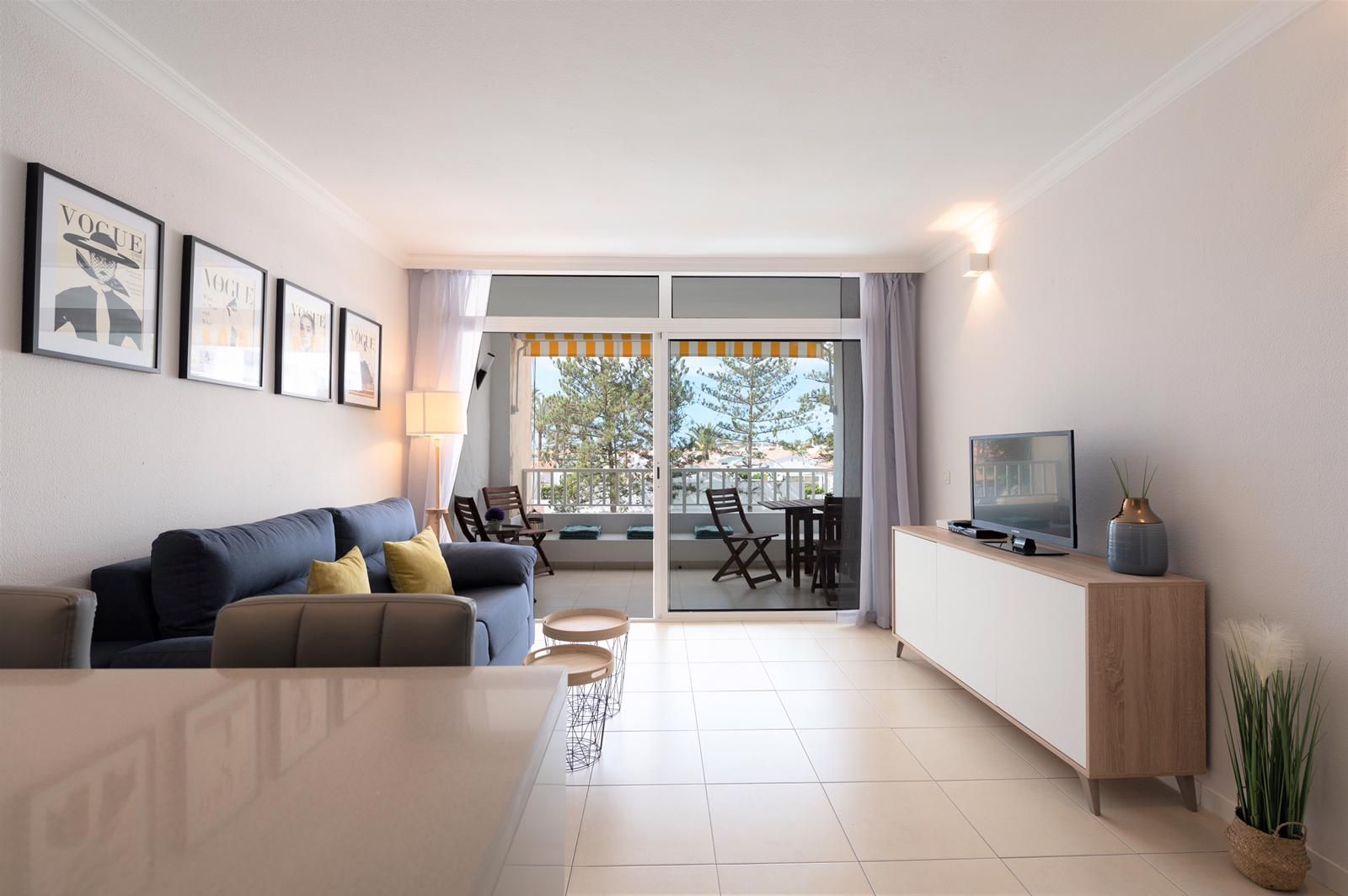 Wide view of the living room and loggia doors