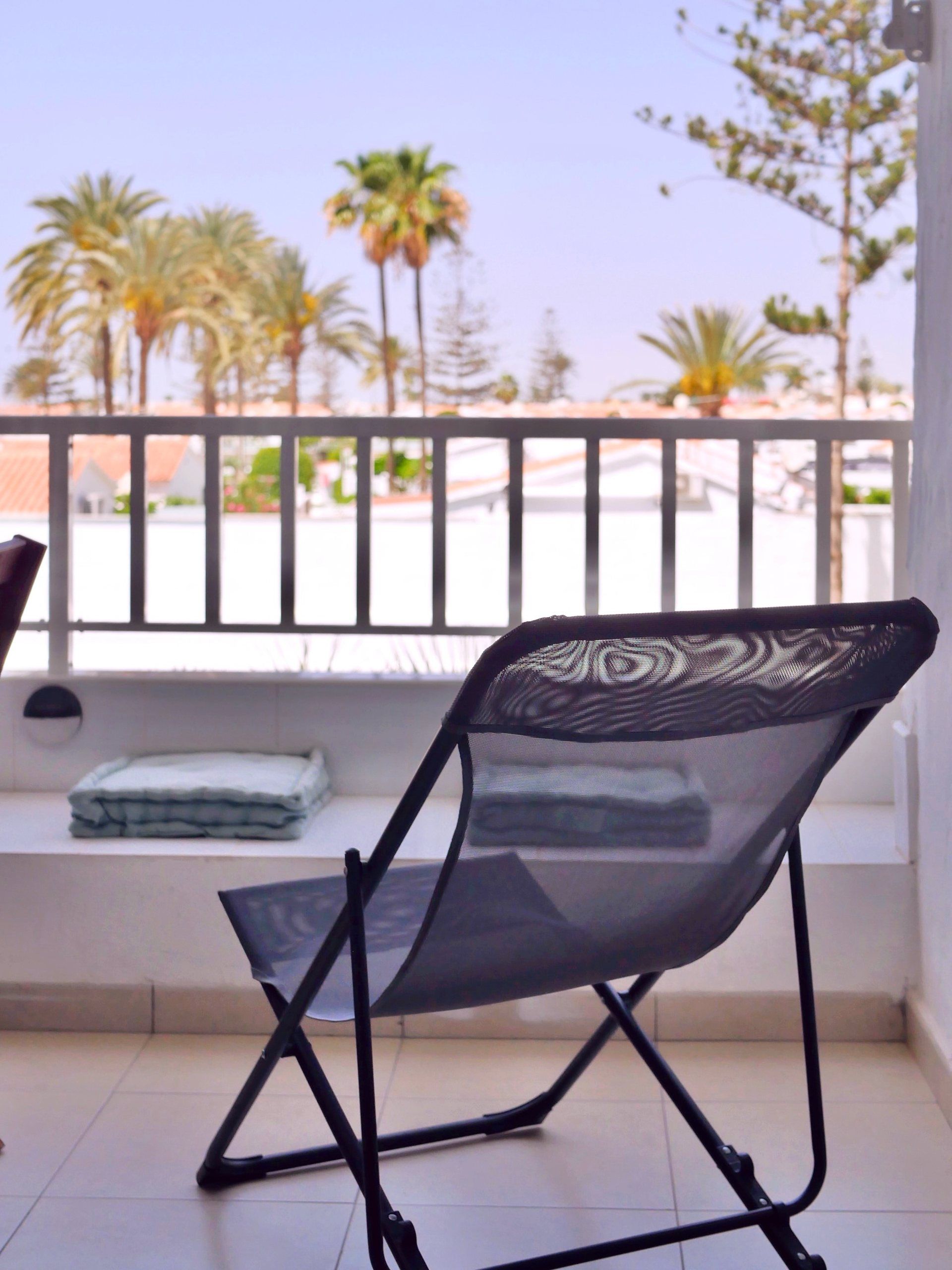 Folding chair on the loggia
